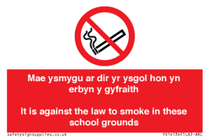 Mae ysmygu ar dir yr ysgol hon yn erbyn y gyfraith It is against the law to smoke in these school grounds - Bilingual Welsh / English